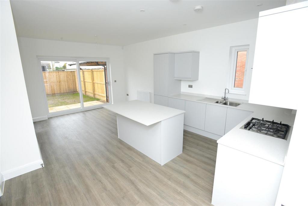 Plot 23 kitchen through to living area.JPG