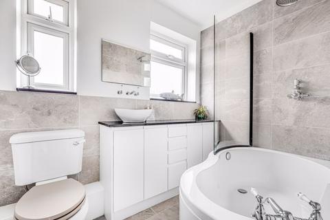 4 Roland Way, Worcester Park, KT4 7HF