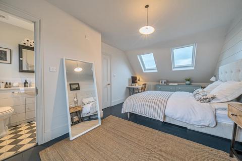 13 Mill Road, London, SW19 2NE