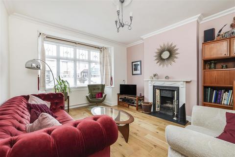 25 Charminster Avenue, London, SW19 3EL