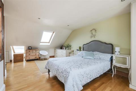 25 Charminster Avenue, London, SW19 3EL