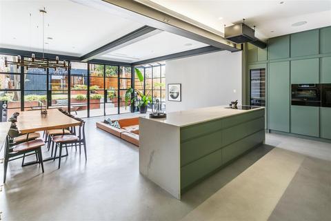103 Dora Road, London, SW19 7JT