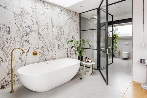 103 Dora Road, London, SW19 7JT