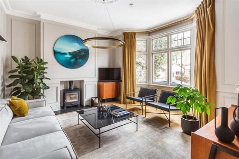 103 Dora Road, London, SW19 7JT
