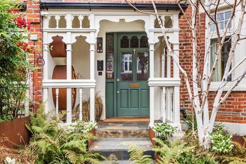 103 Dora Road, London, SW19 7JT