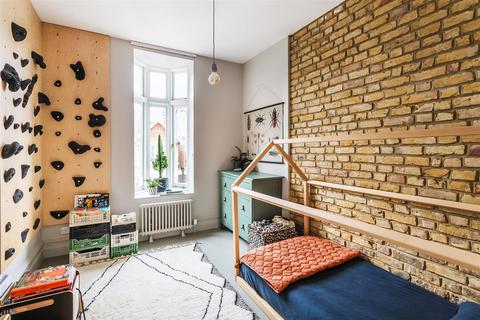 103 Dora Road, London, SW19 7JT