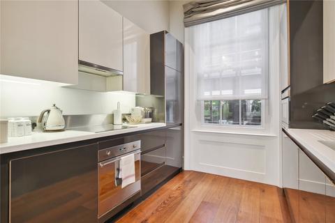 Flat 1, 54 Maddox Street, London, W1S 1AY
