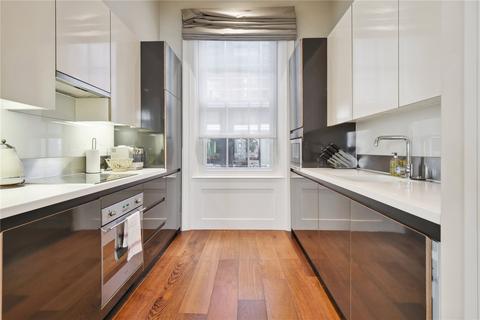 Flat 1, 54 Maddox Street, London, W1S 1AY
