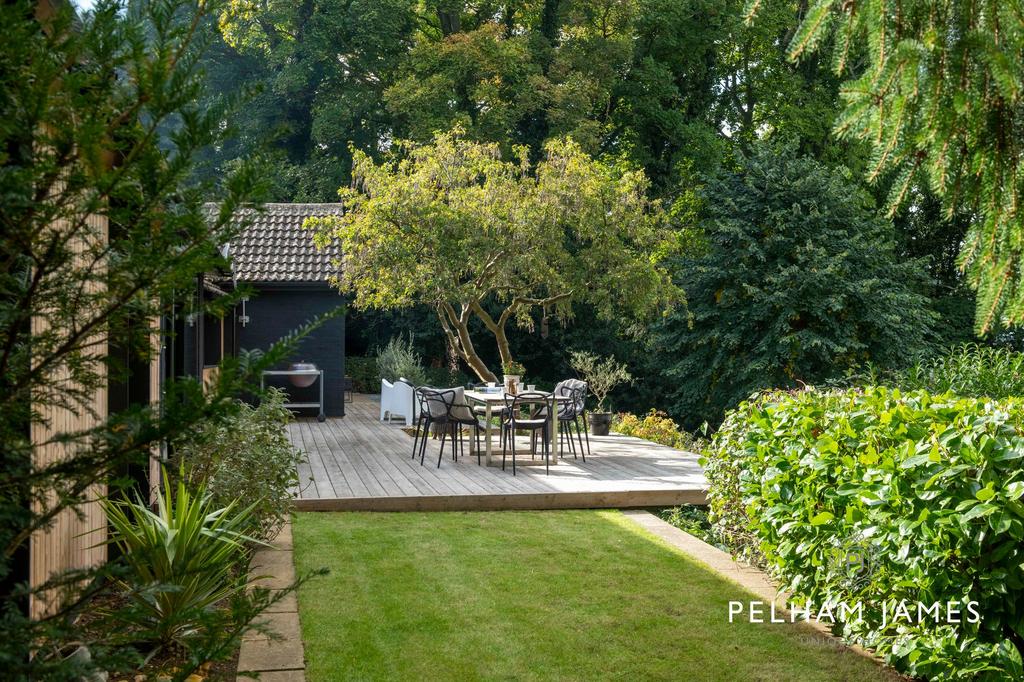 Upper lawn garden and upper deck to rear, The...