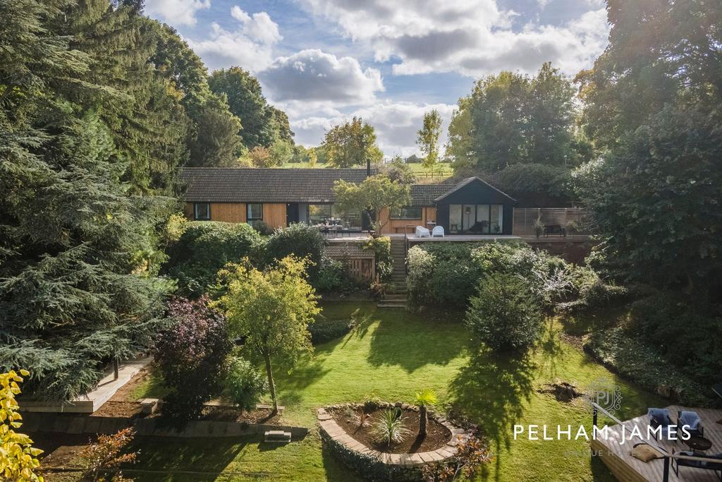 Sloping mature rear gardens, The Architects...