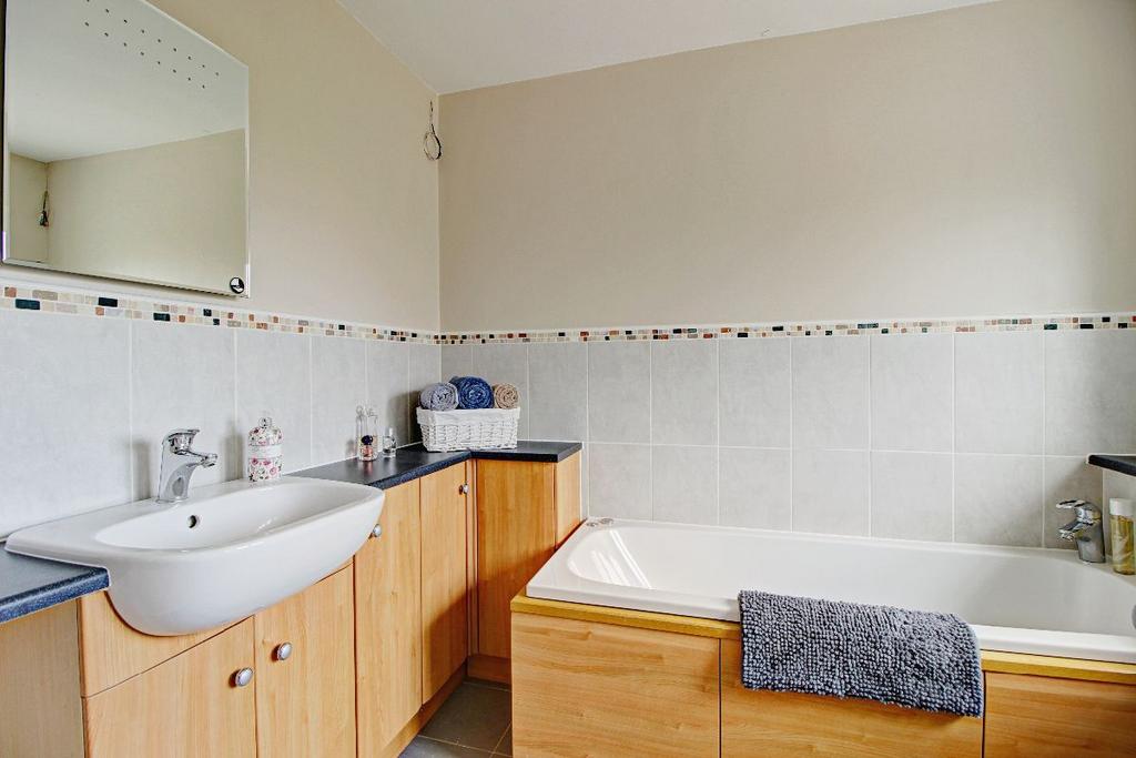 Master en-suite with bath and shower