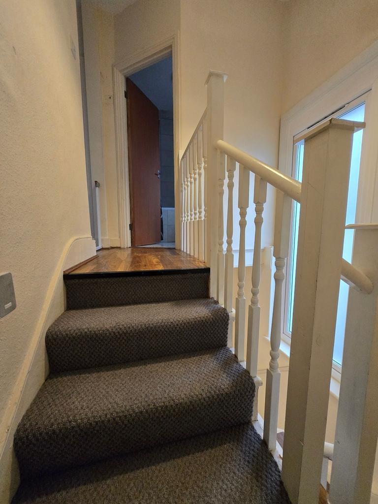 Stairs leading to rooms