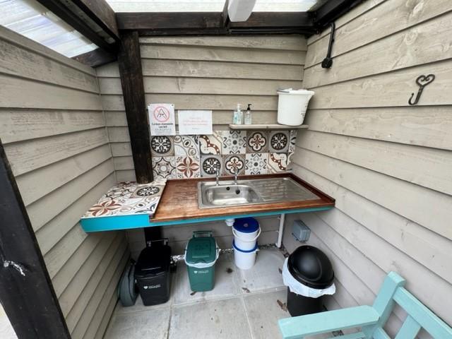 Outside Covered dishwashing area