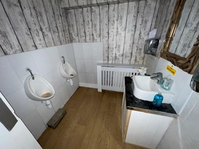 Ladies and Gents Toilets off