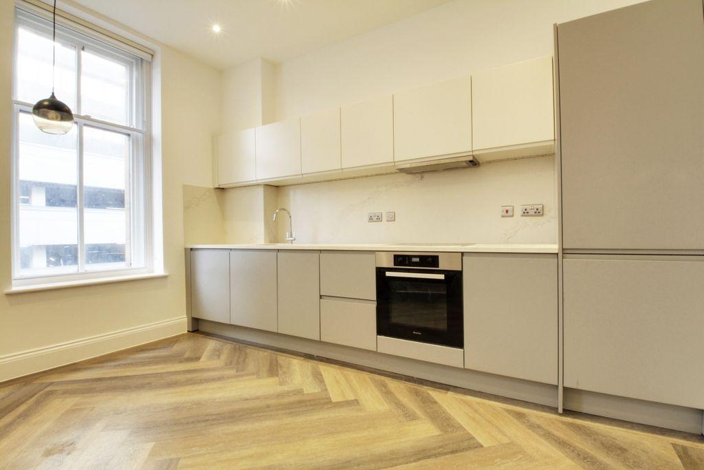 Kitchen area of the open plan room