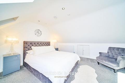4a Arrowsmith Path, Chigwell, IG7 4PW