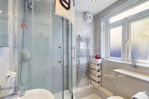 103 Kimble Road, London, SW19 2AU
