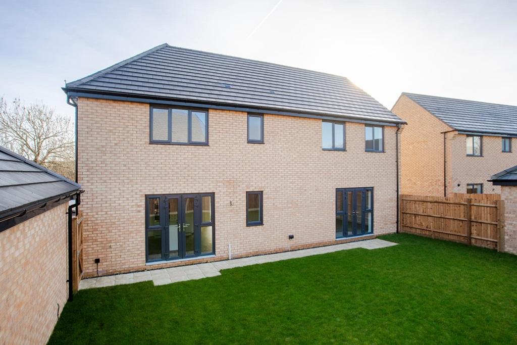 A generous garden with lawn and patio already...