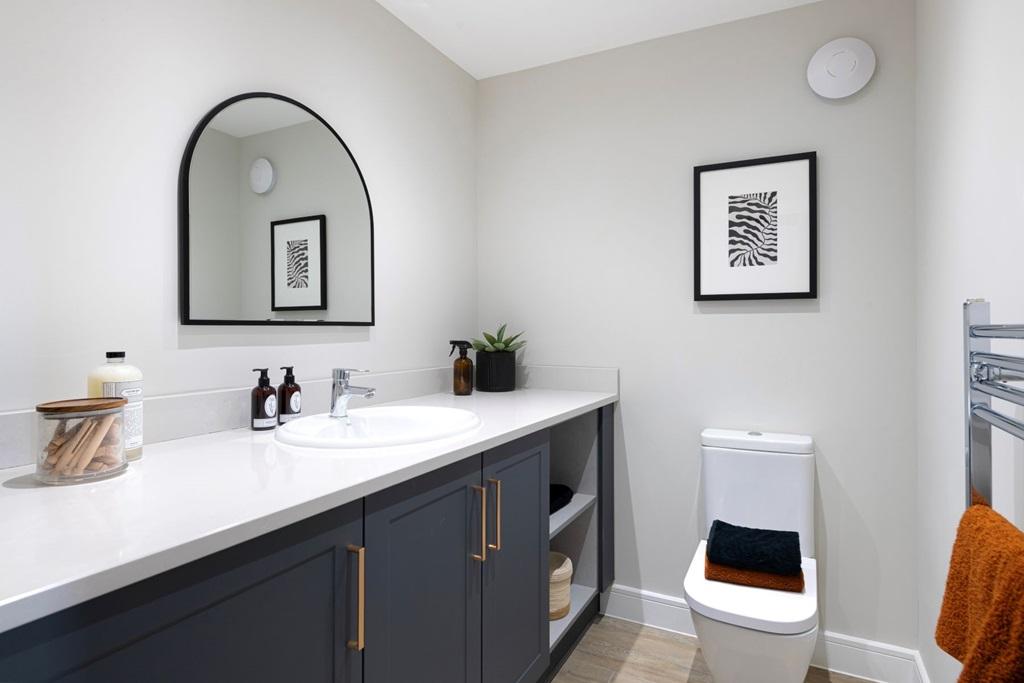 A guest cloakroom completes the ground floor