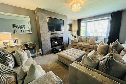 7 Turnberry Drive, Wilmslow, SK9 2QW