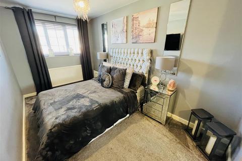 7 Turnberry Drive, Wilmslow, SK9 2QW