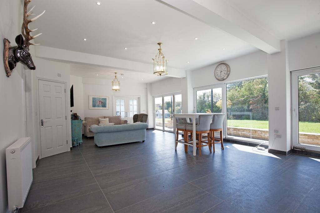 Lounge area in Annex with Bi Fold Doors to the mai