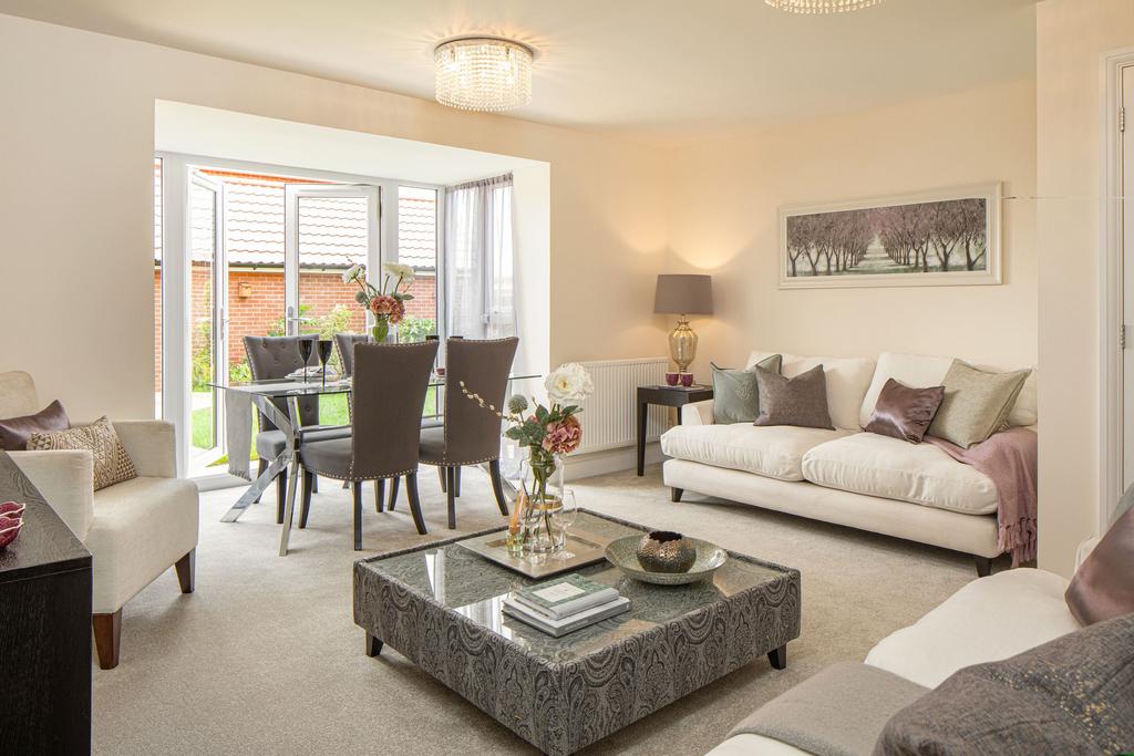 Open plan lounge in the Woodcote 4 bedroom home
