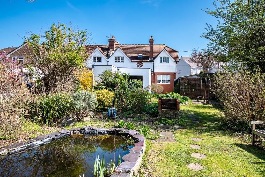 Rear garden with pond and BBQ