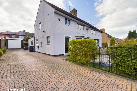8 Grasmere Avenue, Prescot, L34 2SR