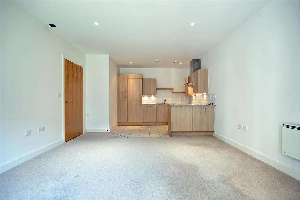 Open plan sitting/dining room and kitchen