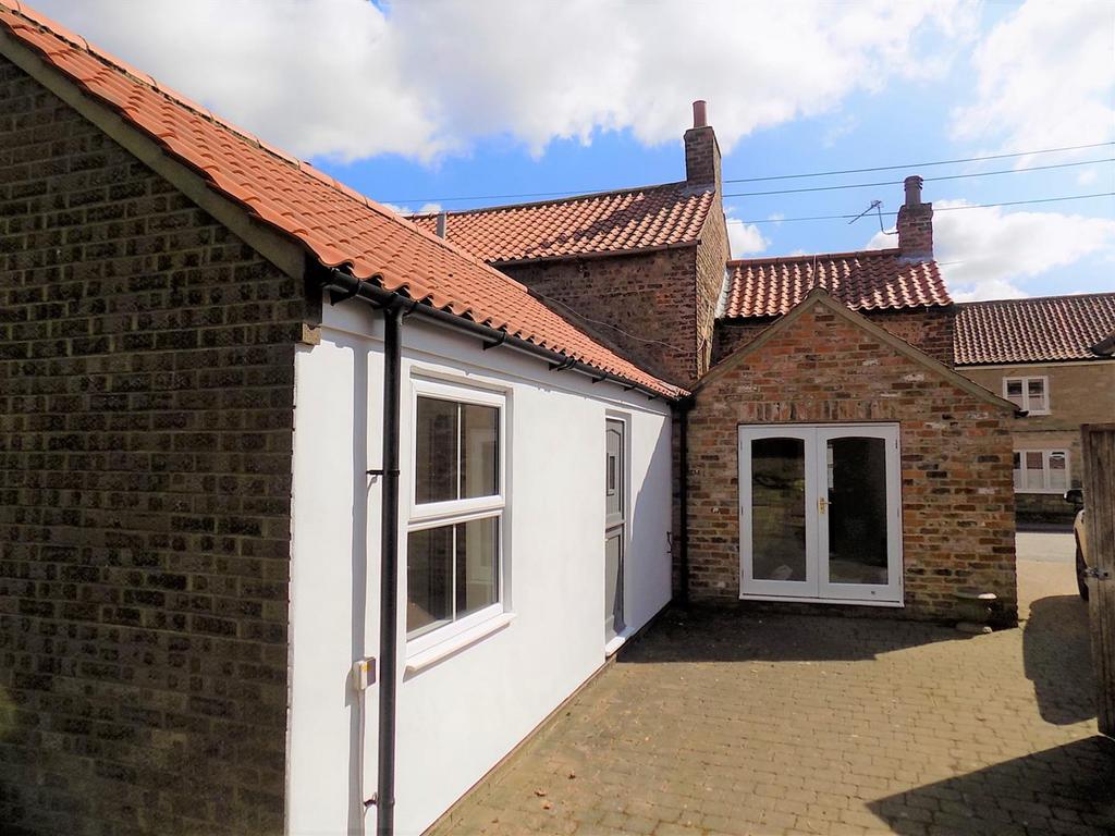 Sunny cottage external.jpg