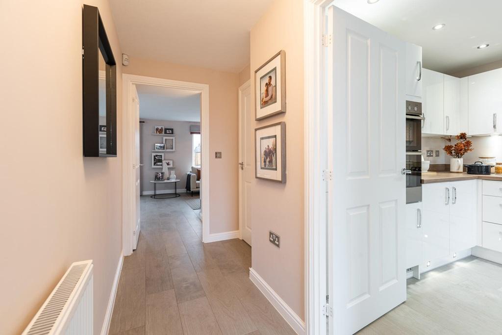 The entrance hall connects the ground floor