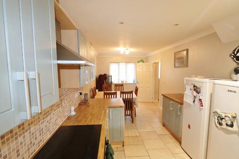 54 Coombe Road, Romford, RM3 0TX
