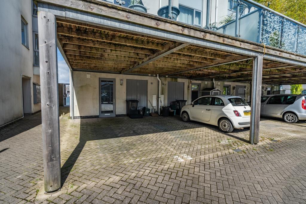 Under croft parking for two cars and access into u