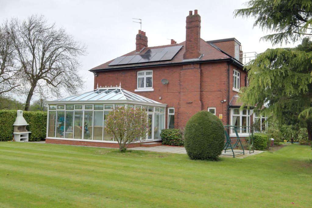 Side Garden and Conservatory