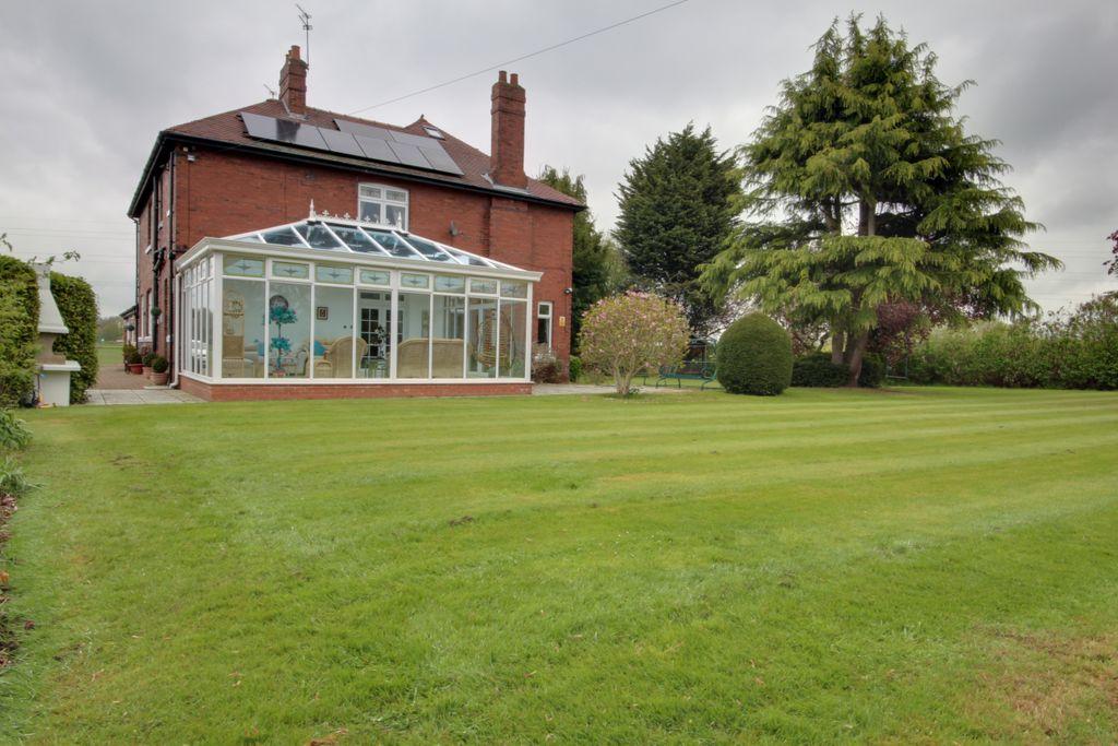 Side Garden and Conservatory