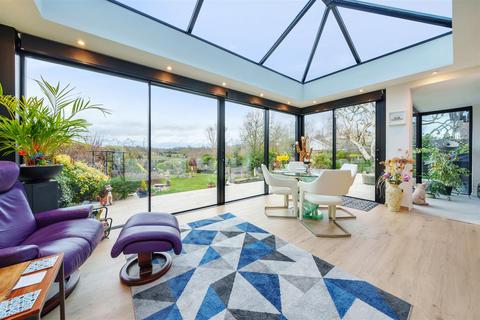 Homelea, 2 Cunningham Road, Banstead, SM7 3HG