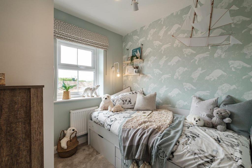 Single children's bedroom decorated with animal...