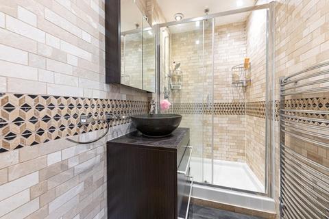 Flat 3, 44 Langham Street, London, W1W 7AU