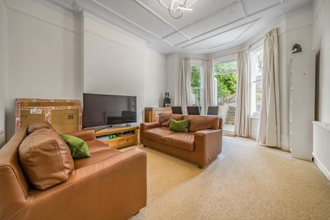90a Woodside, London, SW19 7BA