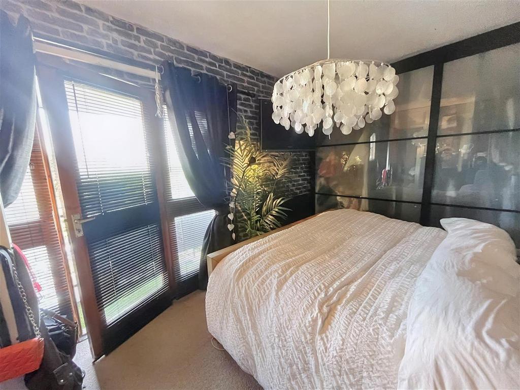 Master bedroom with balcony