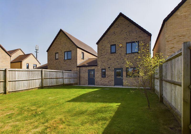 Rear garden to house