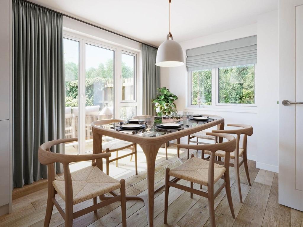 The dining area features double doors out to...
