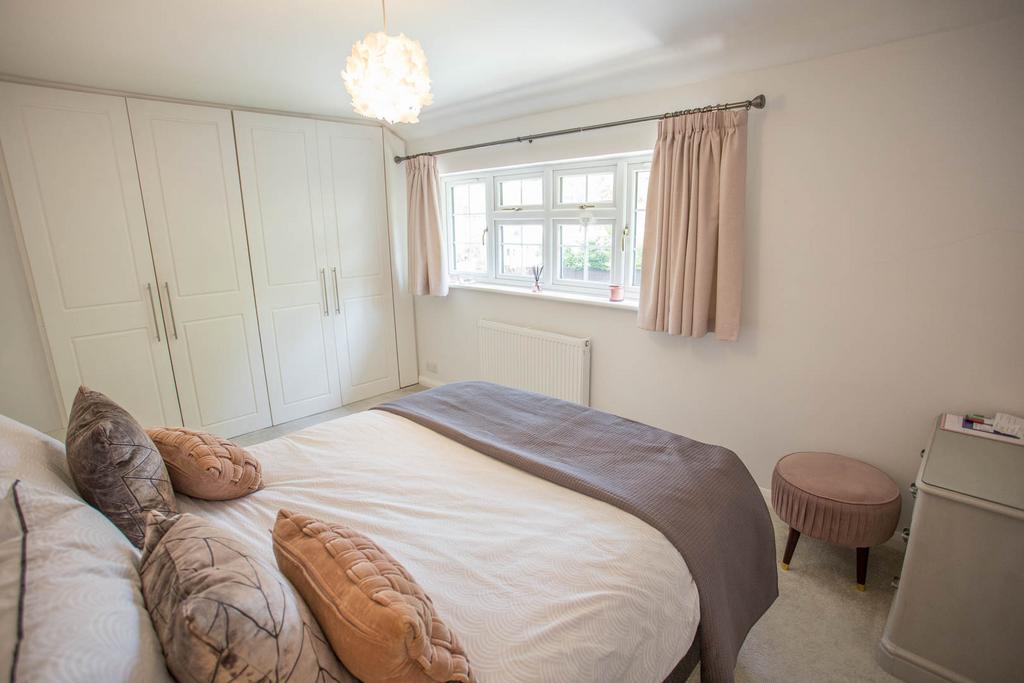 Bedroom 2 with wardrobes