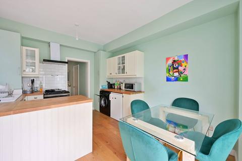 62 Abbey Road, London, SW19 2NA