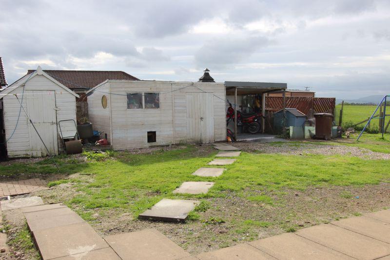 Sheds to the east