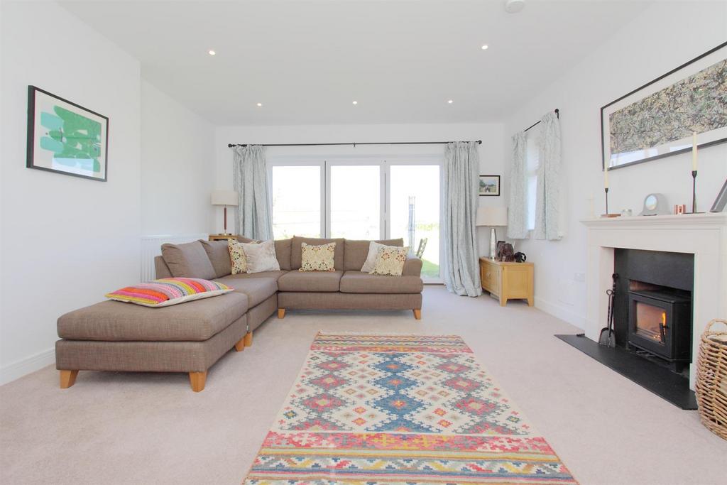 Highfield - Sitting room with woodburner.JPG