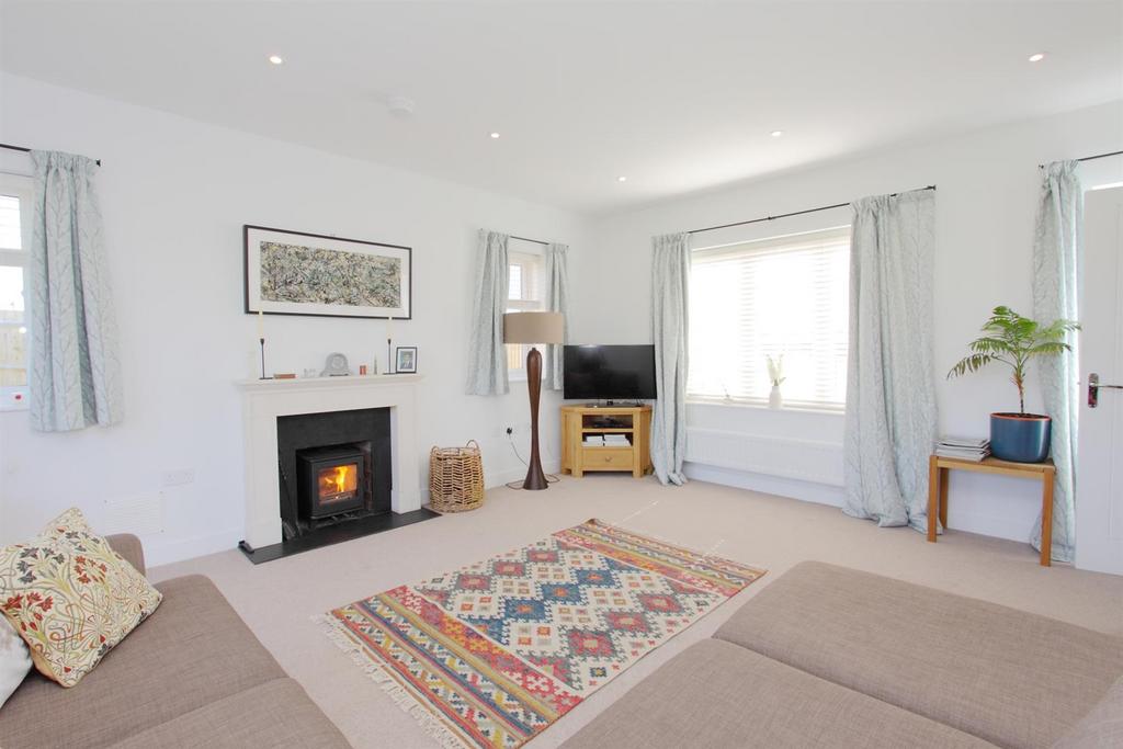 Highfield - Sitting room with woodburner.JPG