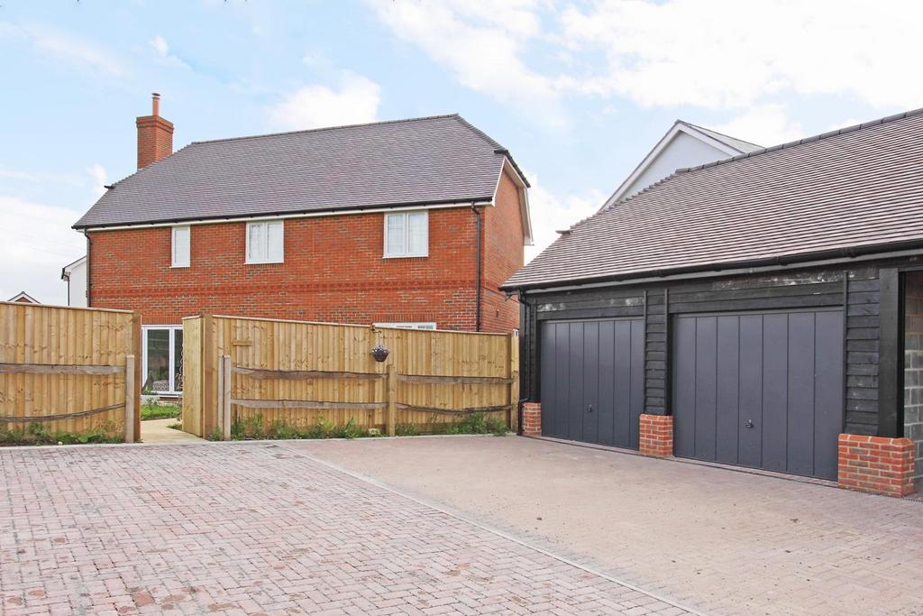 Highfield - Rear of property with double garage.JP