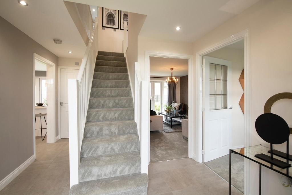 A spacious central hallway with storage